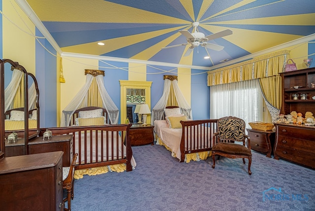 bedroom with ceiling fan and carpet flooring