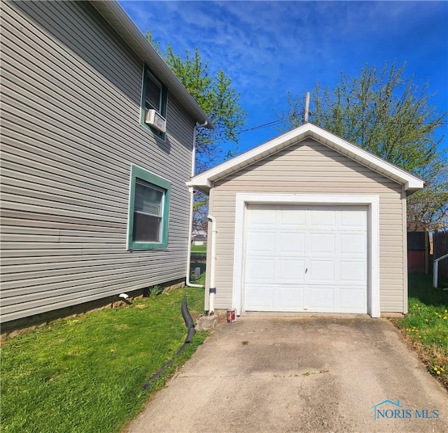 garage featuring a yard