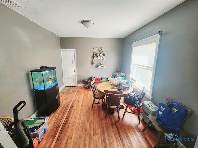 dining room featuring light hardwood / wood-style floors