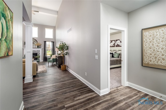 hallway with dark hardwood / wood-style floors