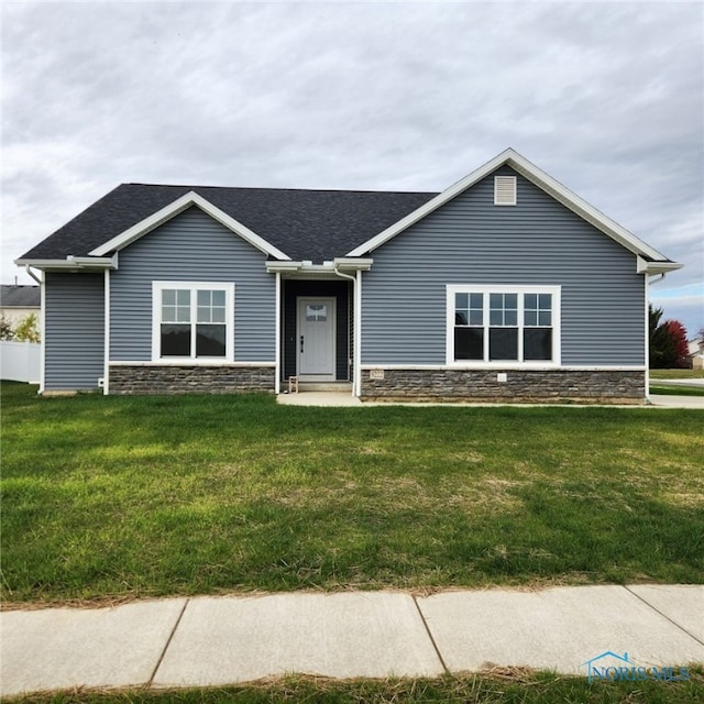 view of front of home with a front lawn