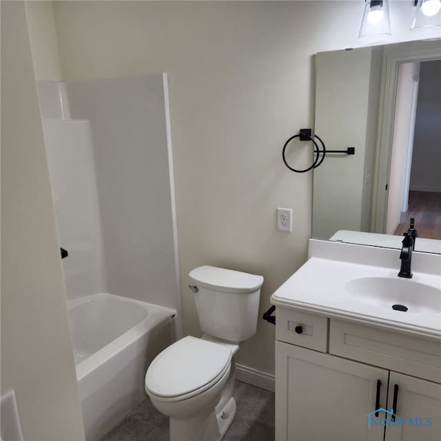 full bathroom with shower / bath combination, vanity, toilet, and tile patterned flooring