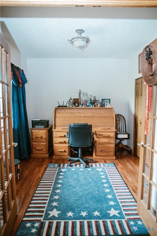 office space featuring wood-type flooring and french doors