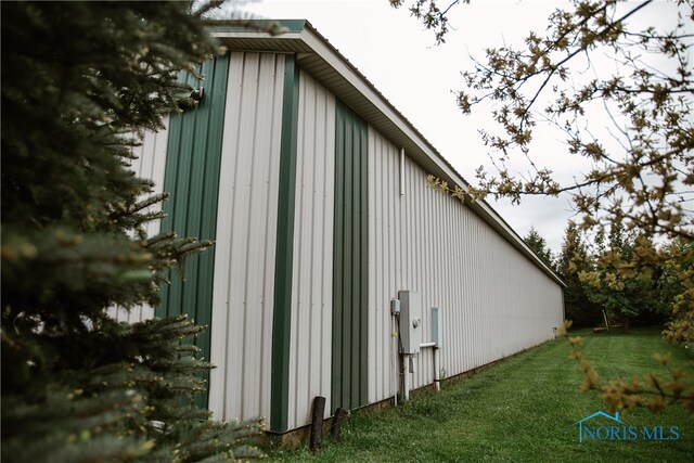 view of home's exterior featuring a yard