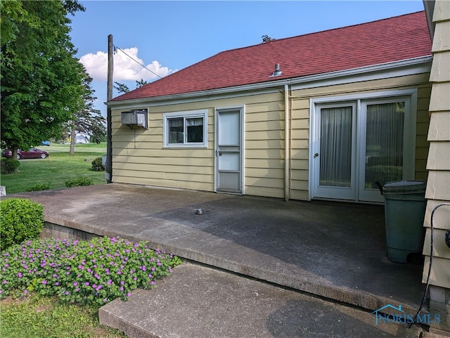 back of house with a patio area