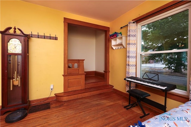 miscellaneous room featuring hardwood / wood-style floors