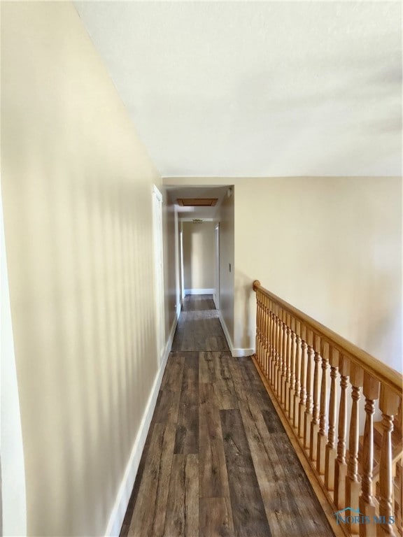 corridor featuring hardwood / wood-style flooring