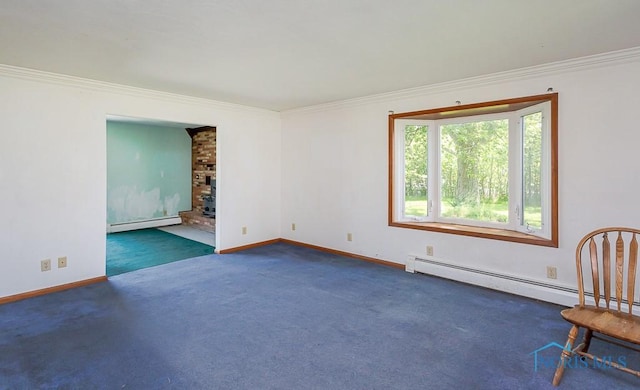 carpeted spare room with a wood stove, a baseboard radiator, and ornamental molding