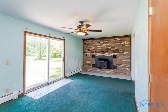 unfurnished living room featuring baseboard heating, a wood stove, ceiling fan, and carpet flooring