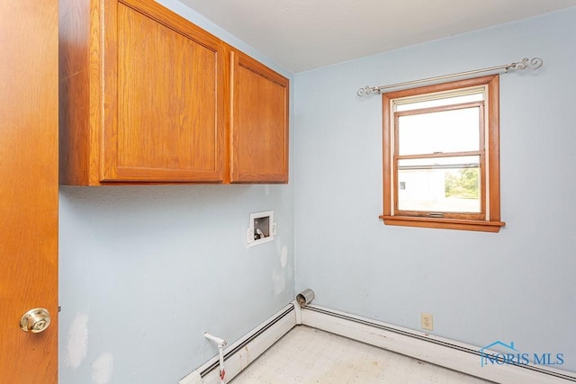 laundry room with hookup for a washing machine, cabinets, and a baseboard heating unit