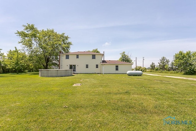 exterior space with a yard