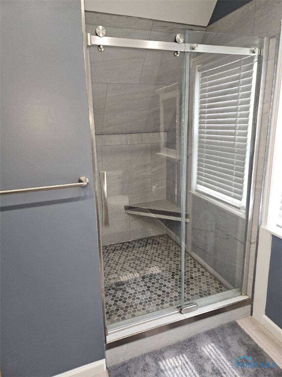 bathroom featuring walk in shower