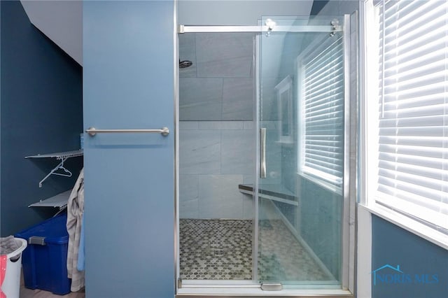 bathroom with an enclosed shower