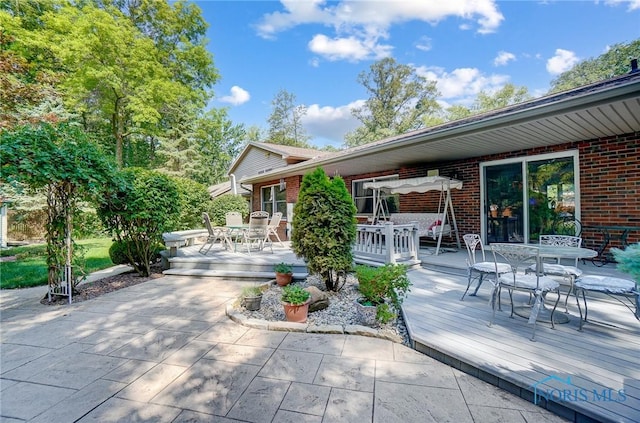 exterior space featuring a wooden deck