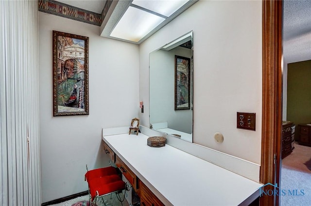 bathroom featuring a textured ceiling