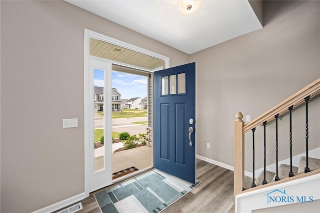 entryway featuring hardwood / wood-style flooring