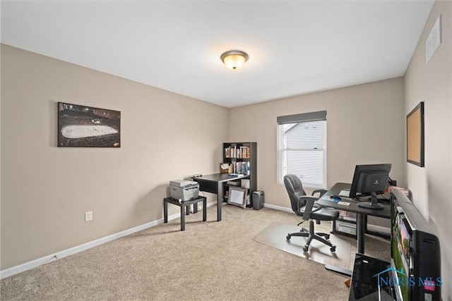 office space with light colored carpet