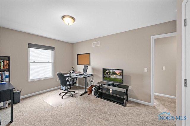 view of carpeted home office