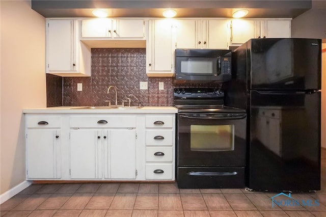 kitchen featuring decorative backsplash, tile patterned flooring, black appliances, and sink