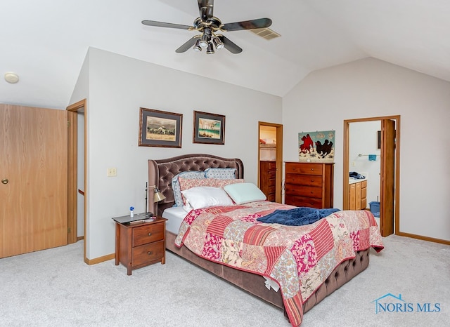 carpeted bedroom with ceiling fan and lofted ceiling