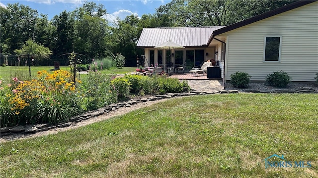 view of yard with a wooden deck