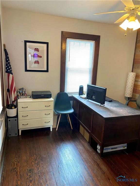 office featuring ceiling fan and dark wood-type flooring