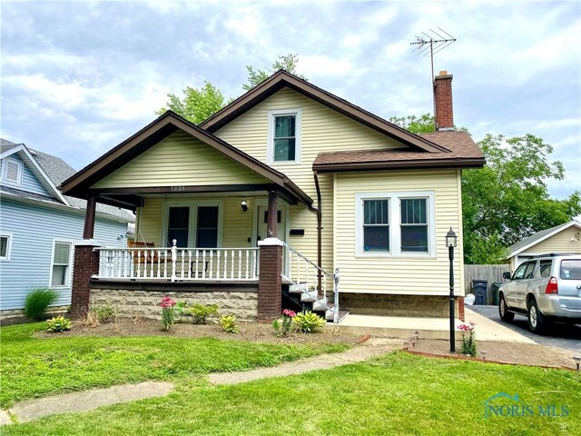 bungalow featuring a porch