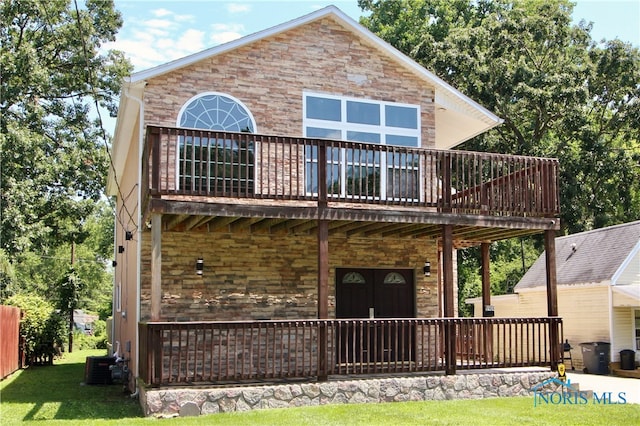 back of property featuring central air condition unit