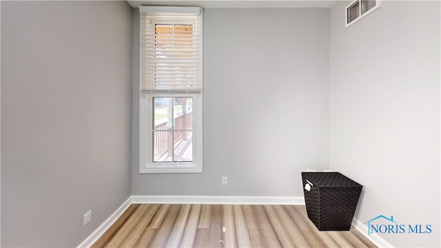 empty room featuring light hardwood / wood-style floors