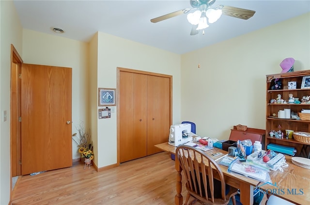 interior space with ceiling fan and light wood-type flooring