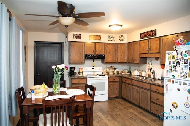 kitchen with sink, white appliances, ceiling fan, extractor fan, and dark wood-type flooring