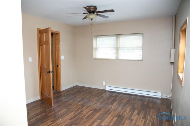 unfurnished room with a baseboard heating unit, ceiling fan, and dark wood-type flooring