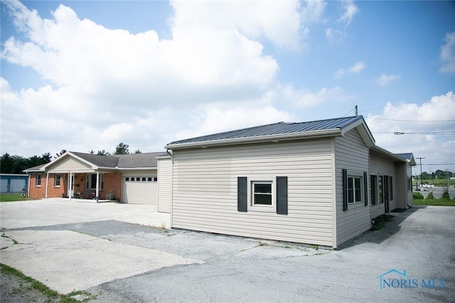 view of home's exterior with a garage