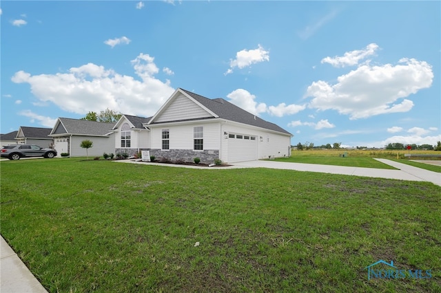 view of home's exterior featuring a lawn and a garage