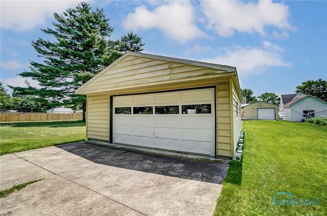 garage with a lawn