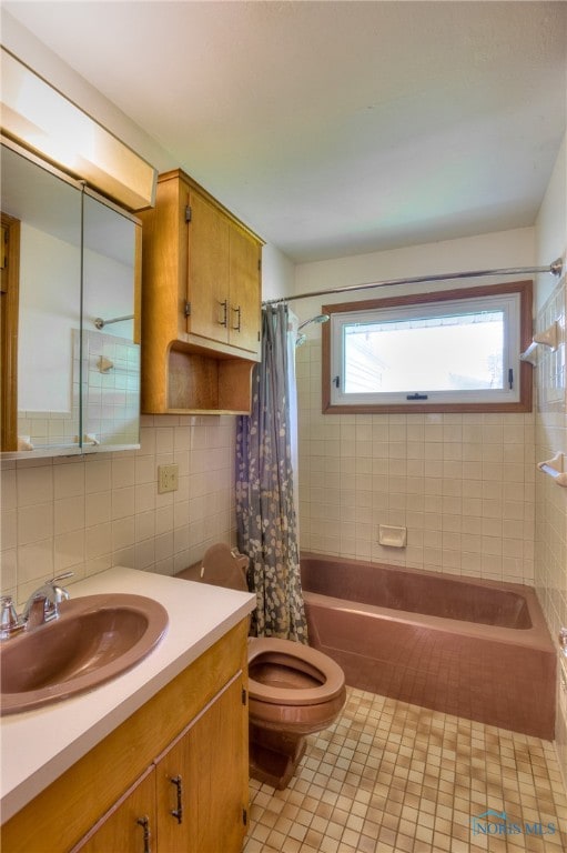 full bathroom with toilet, tile walls, backsplash, tile patterned flooring, and shower / bath combo with shower curtain