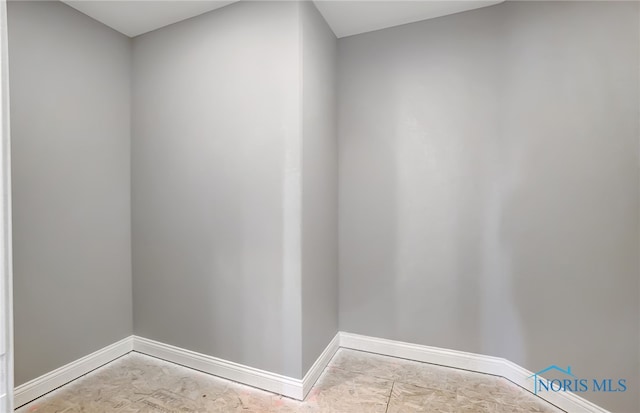 washroom with light tile patterned floors