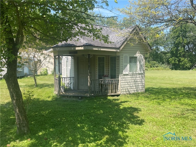 exterior space featuring a yard