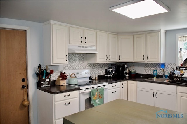 kitchen featuring sink, white electric range, and white cabinets