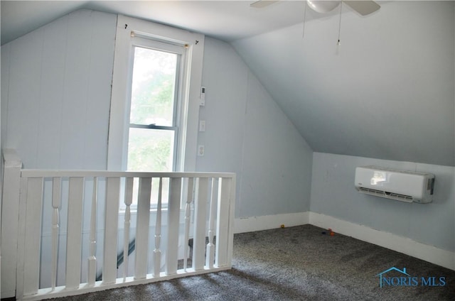 bonus room with ceiling fan, lofted ceiling, carpet flooring, and a wall mounted AC