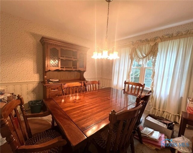 dining room featuring a chandelier