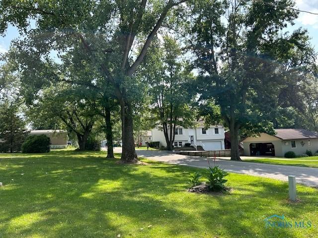 view of yard featuring a garage