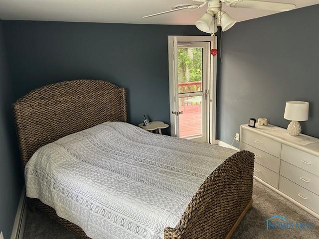 carpeted bedroom featuring ceiling fan