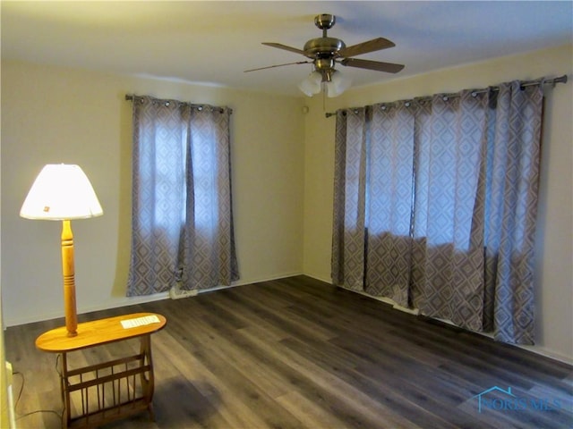 spare room featuring ceiling fan and hardwood / wood-style floors