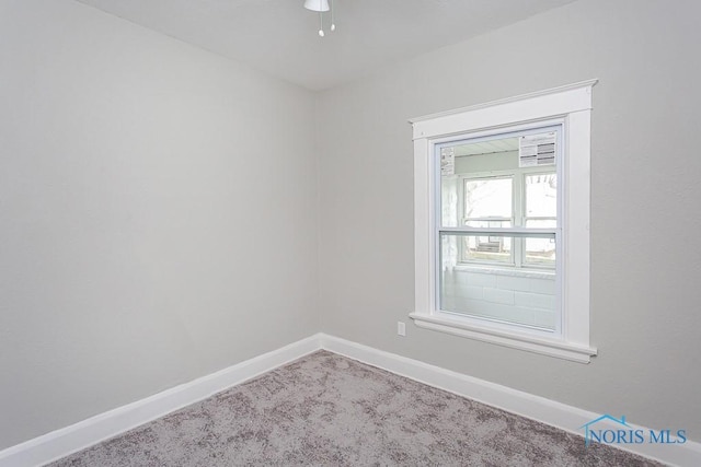 unfurnished room featuring carpet floors