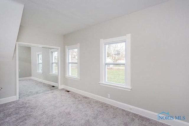 empty room with light carpet