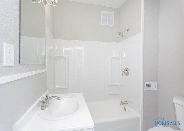 full bathroom featuring vanity, toilet, and tub / shower combination