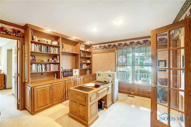 carpeted office space with ornamental molding