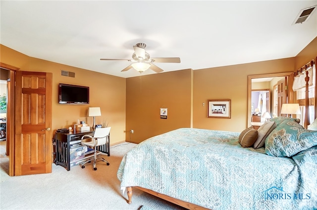 carpeted bedroom featuring ceiling fan