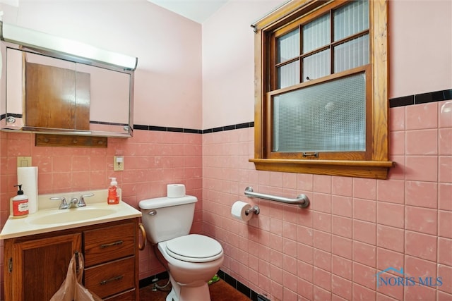 bathroom with tile walls